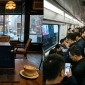 cozy dim NYC cafe table with latte and laptop screen showing buffering loading circle, right side: bright crowded Shanghai subway car with passengers holding phones with vivid colorful screens