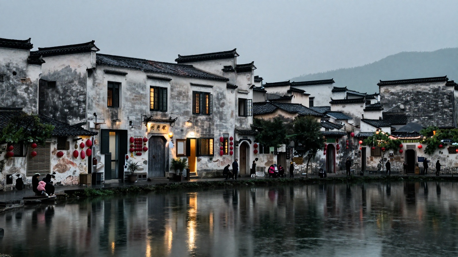 Rainy evening view of an ancient canal in Huizhou village with traditional architecture reflecting in the water