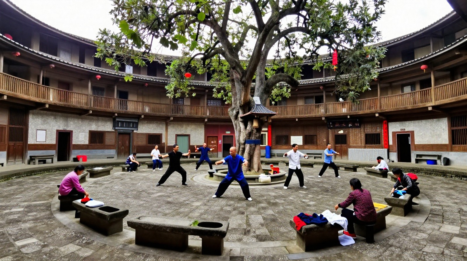 Hakka villagers practicing daily activities like Tai Chi and washing clothes inside a traditional circular earth building courtyard