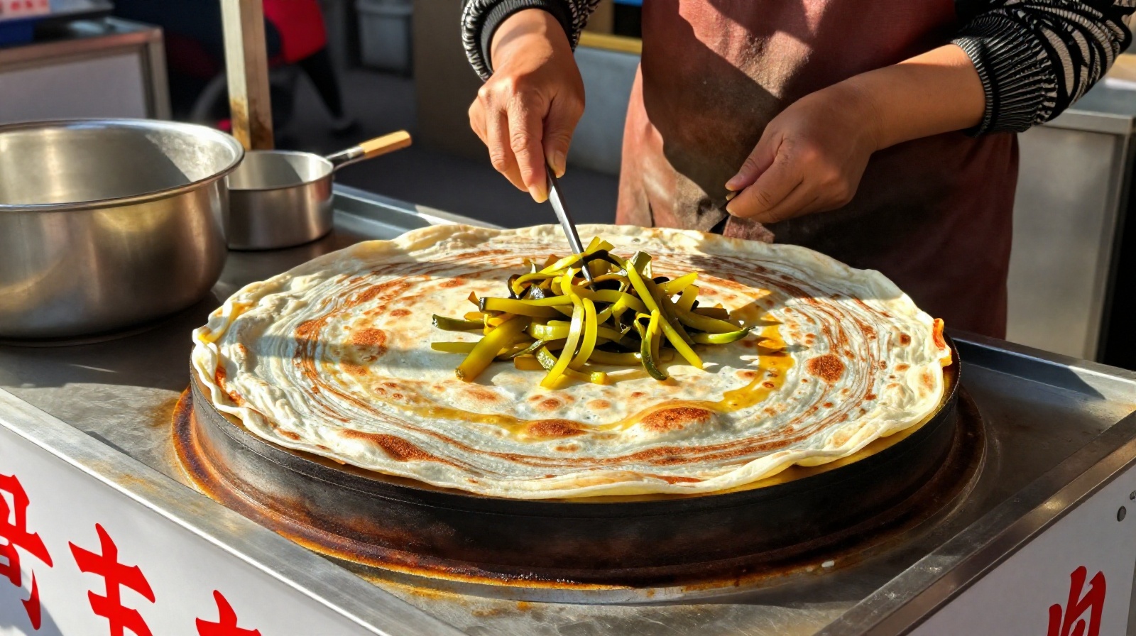 A vendor preparing traditional Wuhan Doupi on a street cart during the afternoon snack time