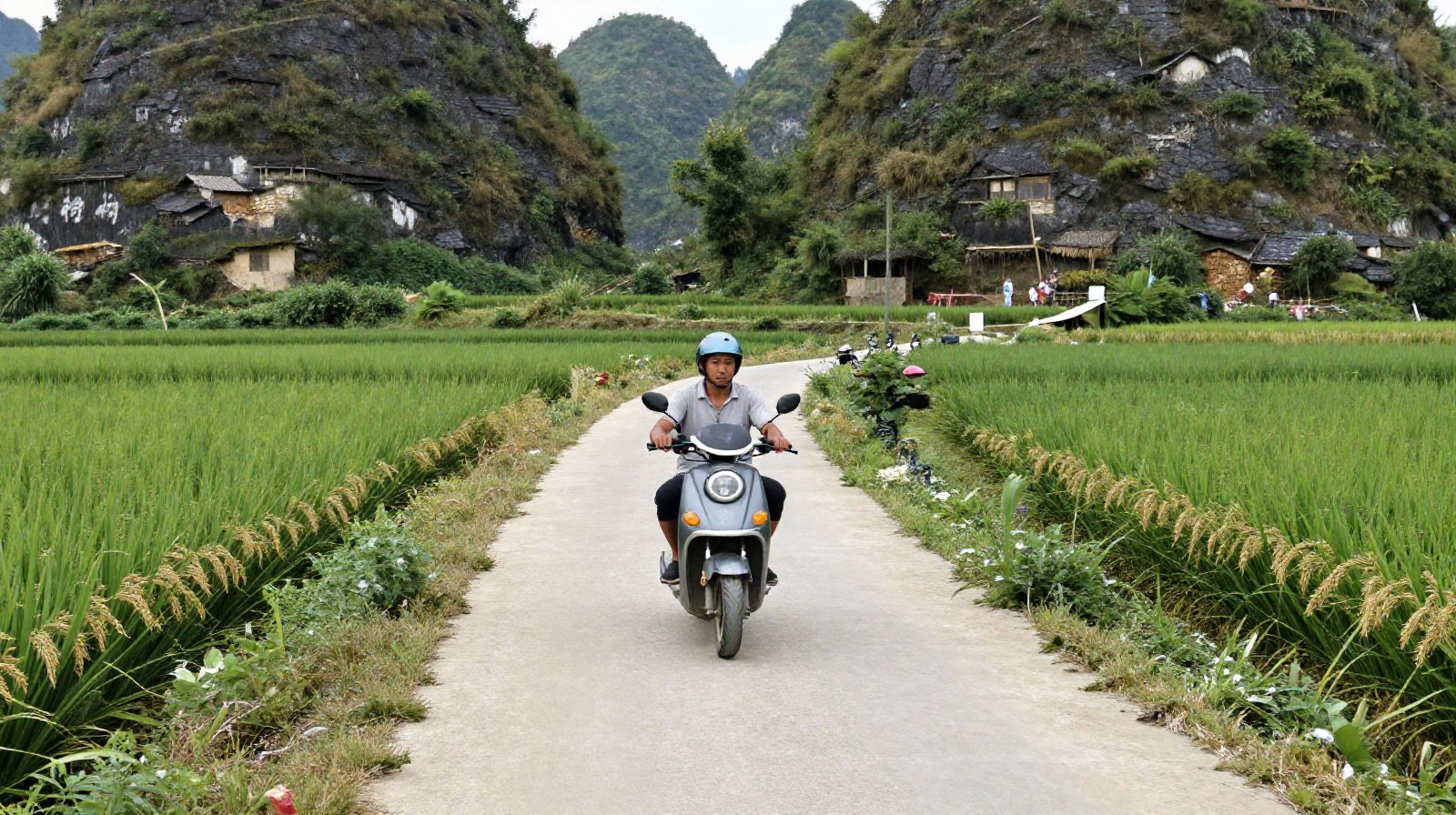 Local farmers riding electric scooters on a rural dirt road near Guizhou's karst mountains