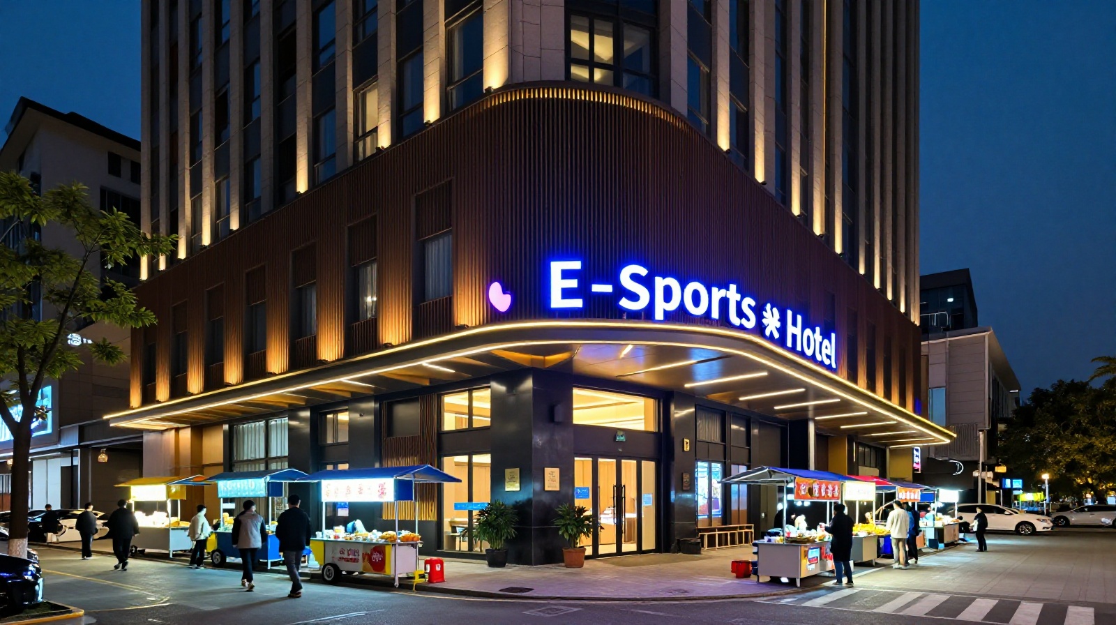 Nighttime exterior view of a hotel building in a bustling Chinese city featuring prominent E-sports branding and glowing signage on the facade.