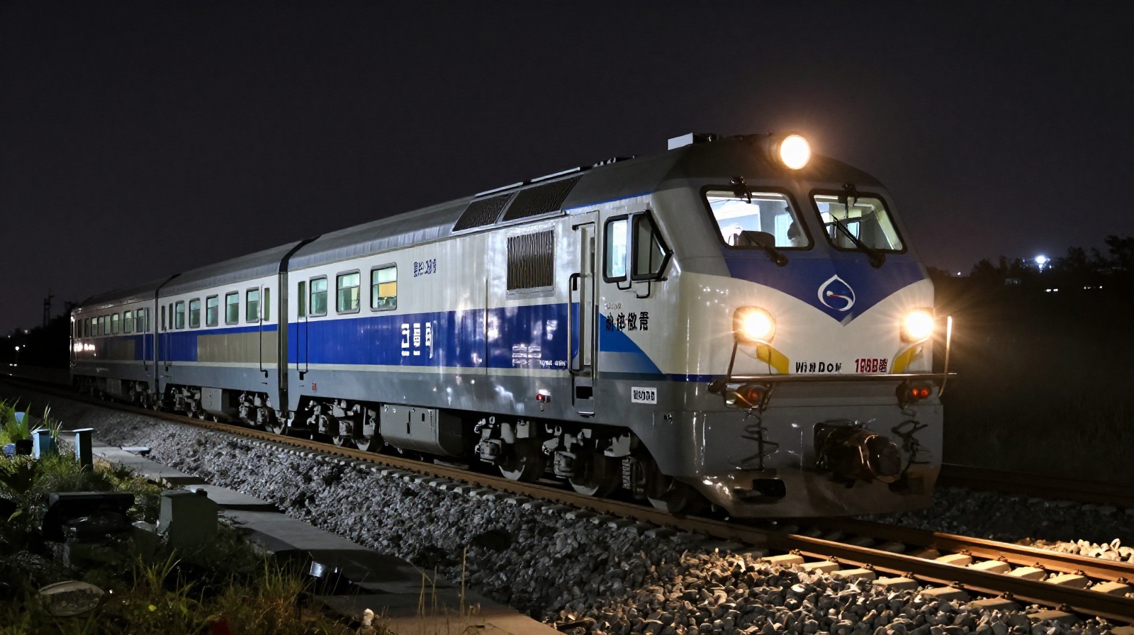 Maintenance train inspecting high-speed rail tracks during overnight service hours