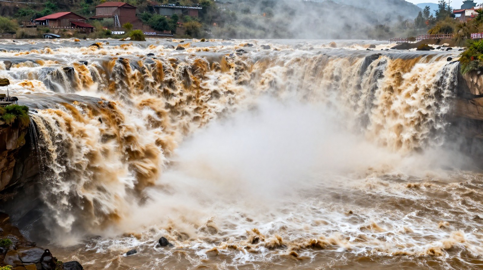 The powerful and turbulent waters of the Yellow River at Hukou Waterfall