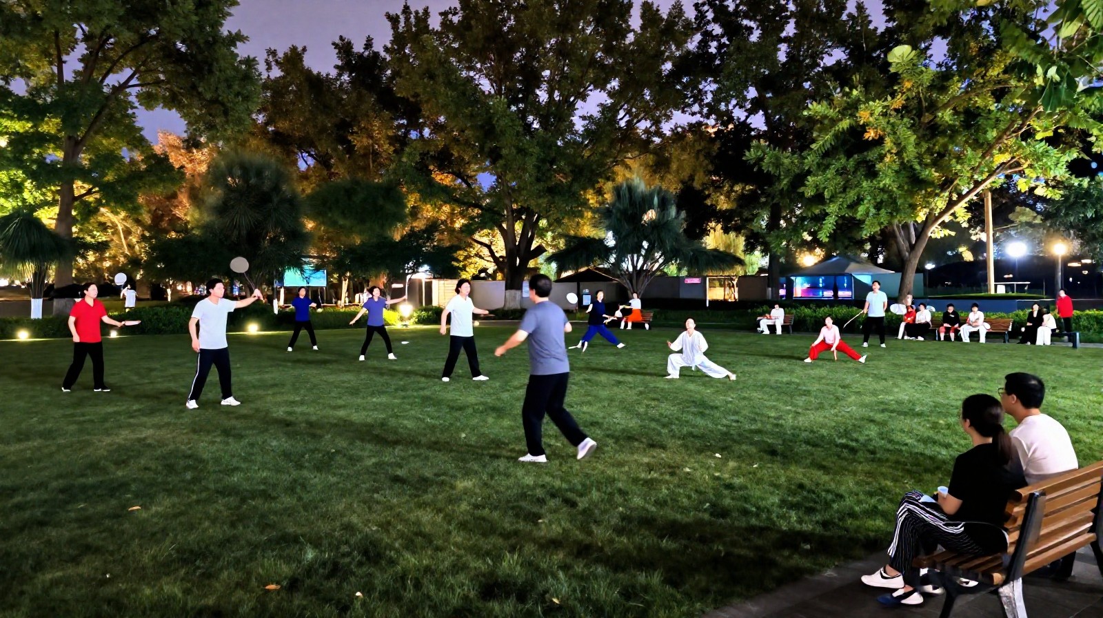 Residents enjoying evening leisure activities like badminton and yoga in a public park in Hangzhou