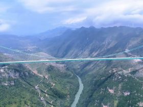 1420 Meters Across: How China's Huijiang Canyon Bridge Changed Mountain Travel