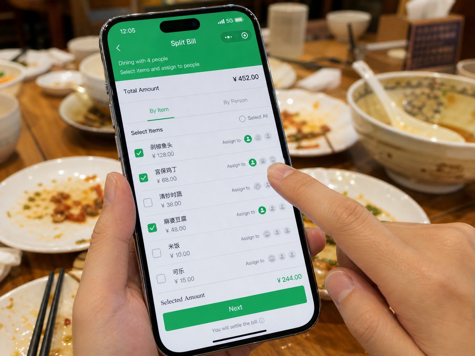 Using WeChat's split bill feature to divide restaurant costs digitally among friends in China.