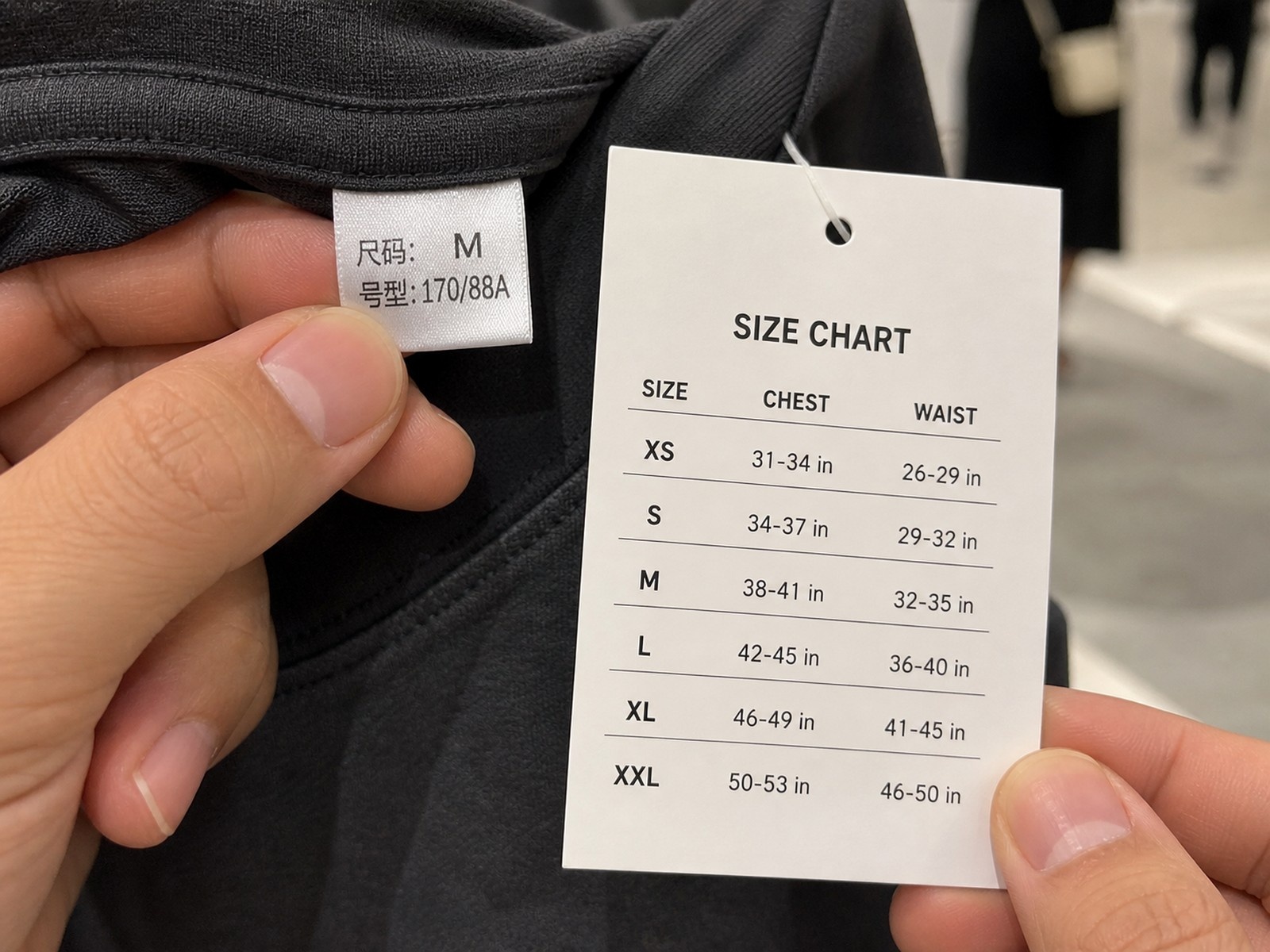 Comparison between a Chinese clothing size M label and a standard Western size chart