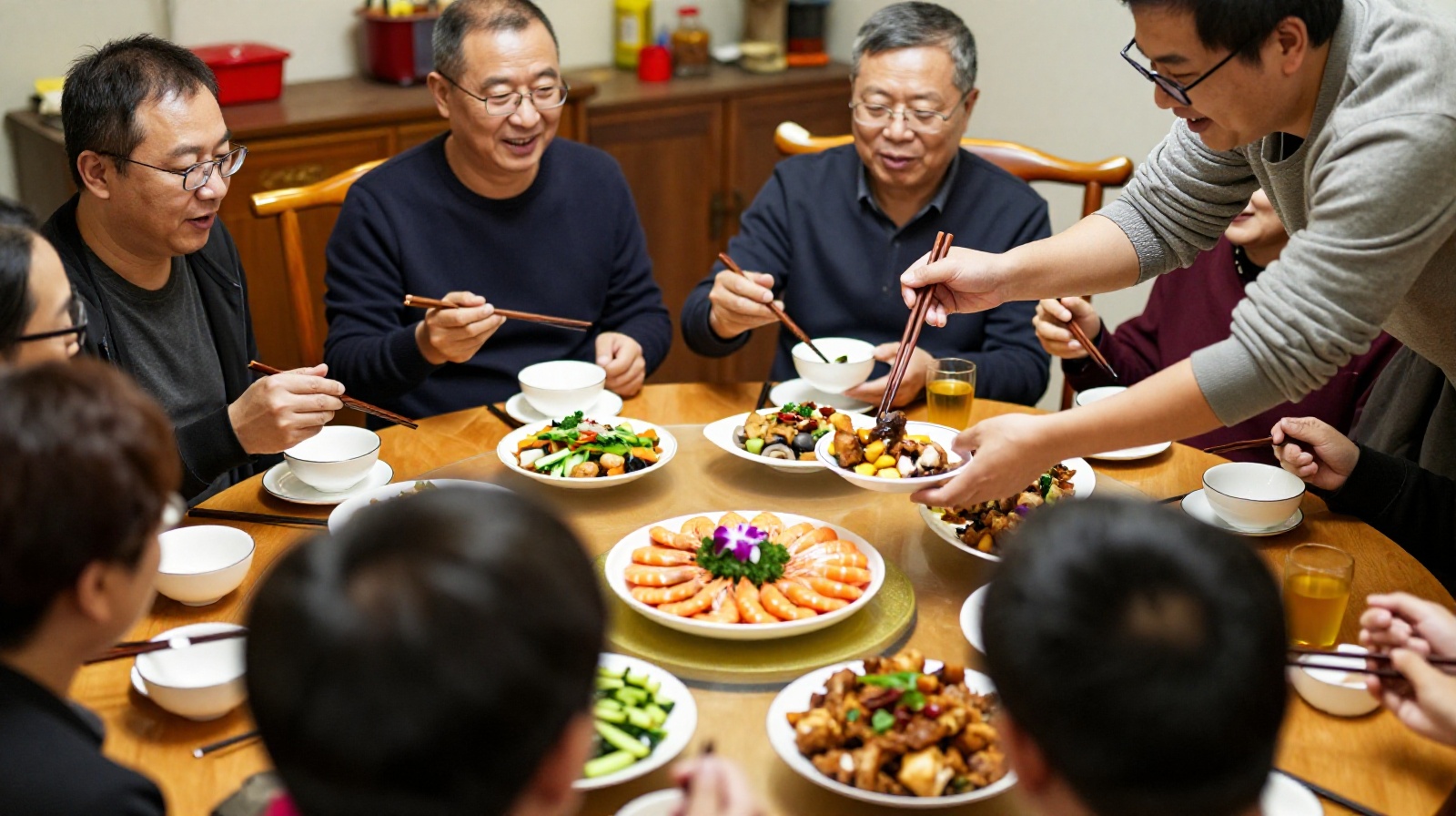 A Chinese host serving abundant food to a guest at the dinner table, illustrating the culture of hospitality.