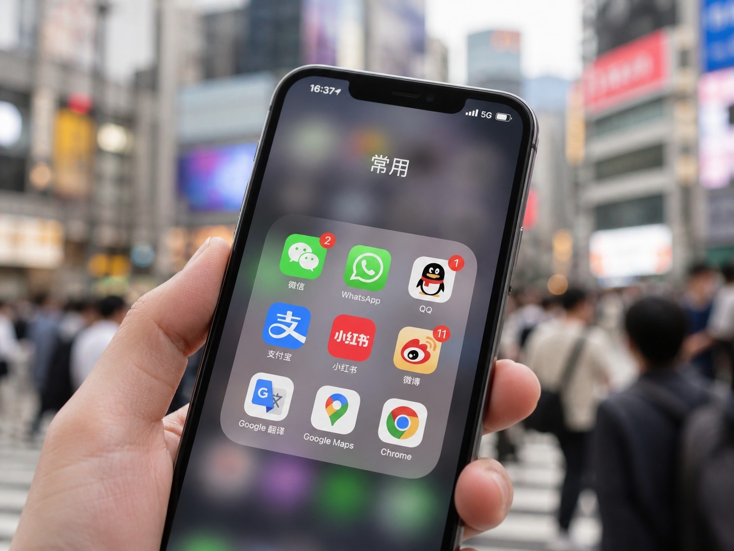 A close-up view of a smartphone screen showing a mix of international apps like WhatsApp and Chinese local apps like WeChat, symbolizing the dual digital life of expats in China.