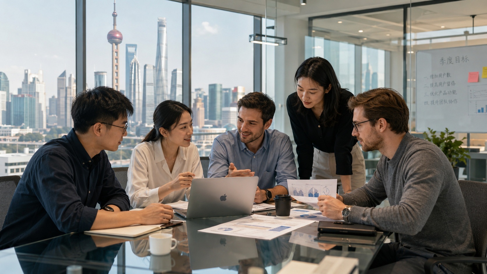 Young professionals collaborating in a modern Shanghai office, illustrating the contemporary workplace environment for foreign workers in China.