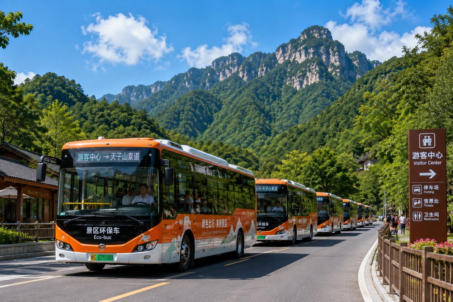 Line of official eco-buses transporting tourists to the entrance of a Chinese national park or scenic mountain area.