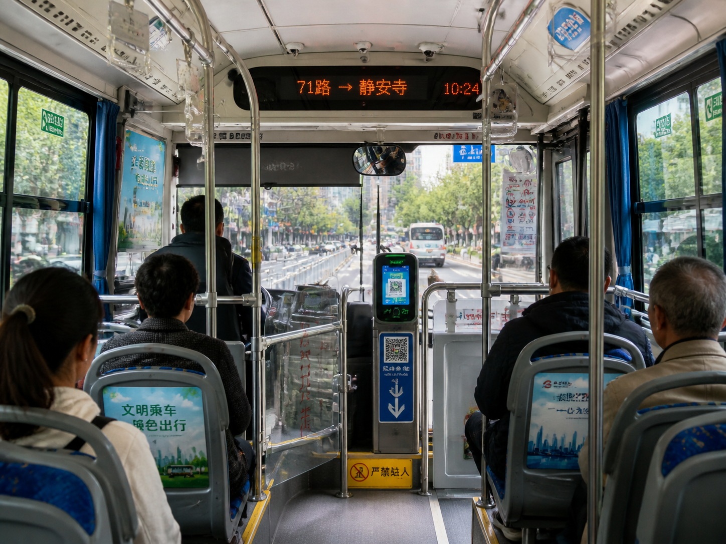 Interior of a modern public bus in China with visible payment scanning equipment
