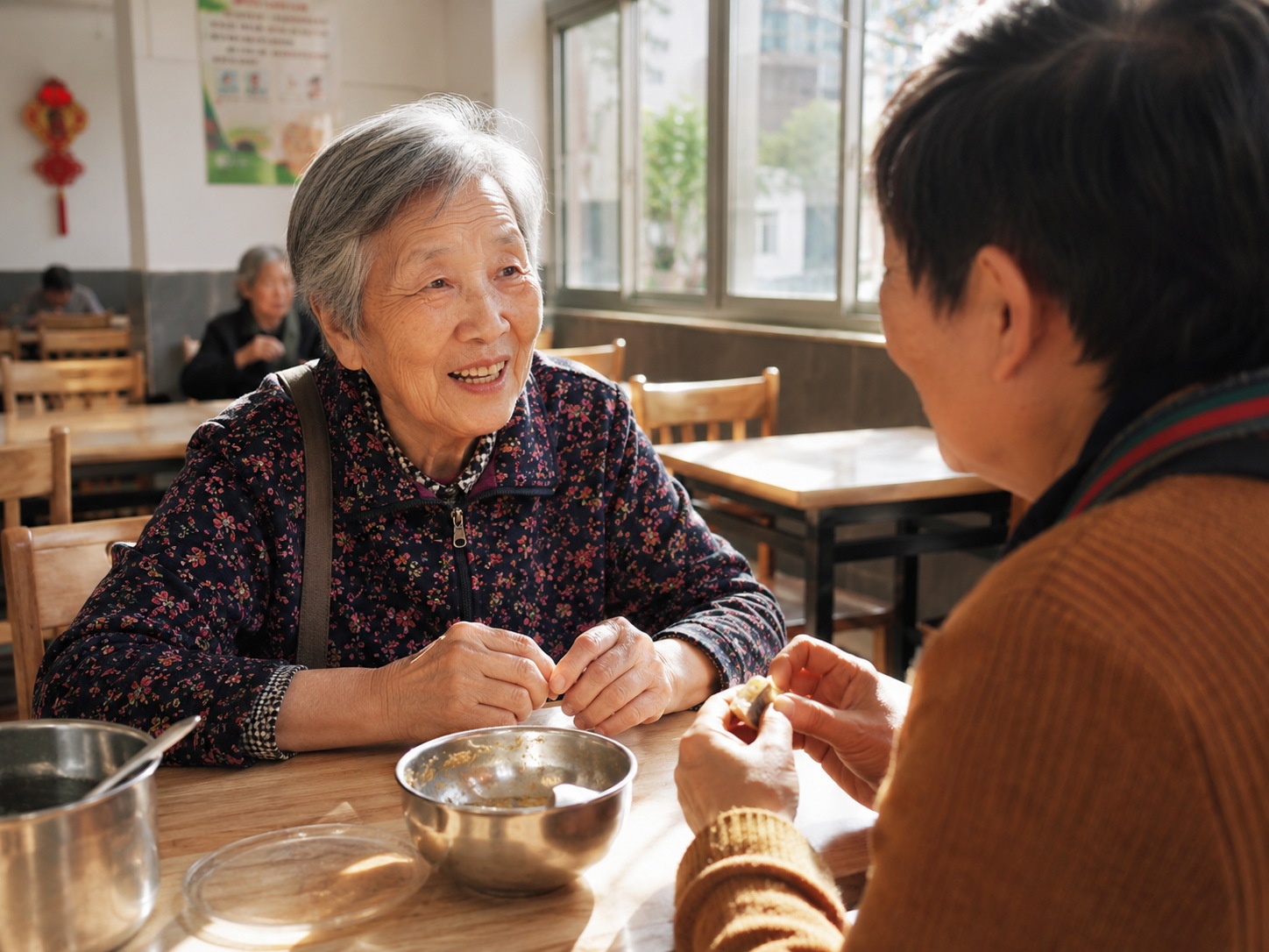 An elderly woman enjoying lunch and chatting with a neighbor at a community canteen in China.