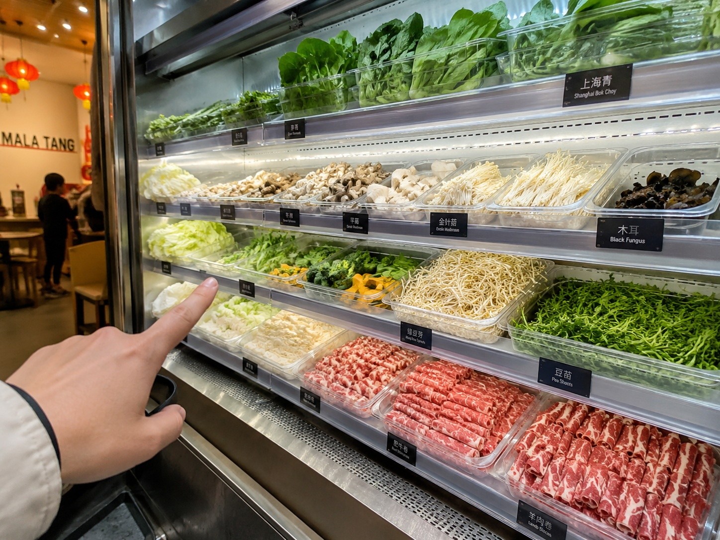 Customer selecting fresh ingredients like vegetables and mushrooms from a display shelf at a Yang Guofu or Zhang Liang restaurant.
