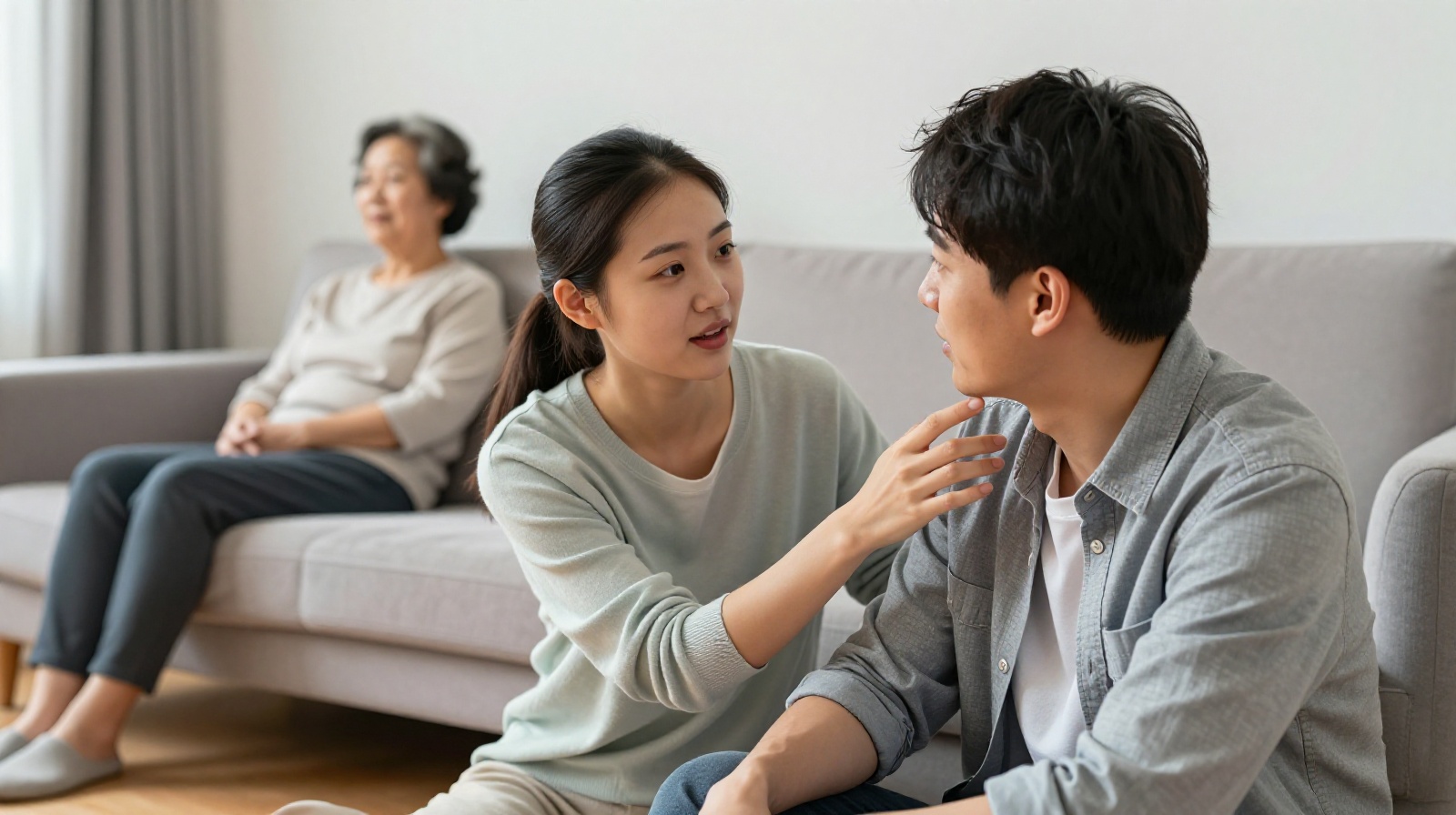 A Chinese family interacting in their living room, illustrating indirect communication and family dynamics.