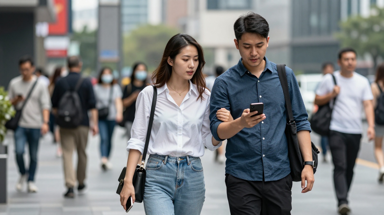 Young professionals in a modern Chinese city discussing divorce photography services on a smartphone