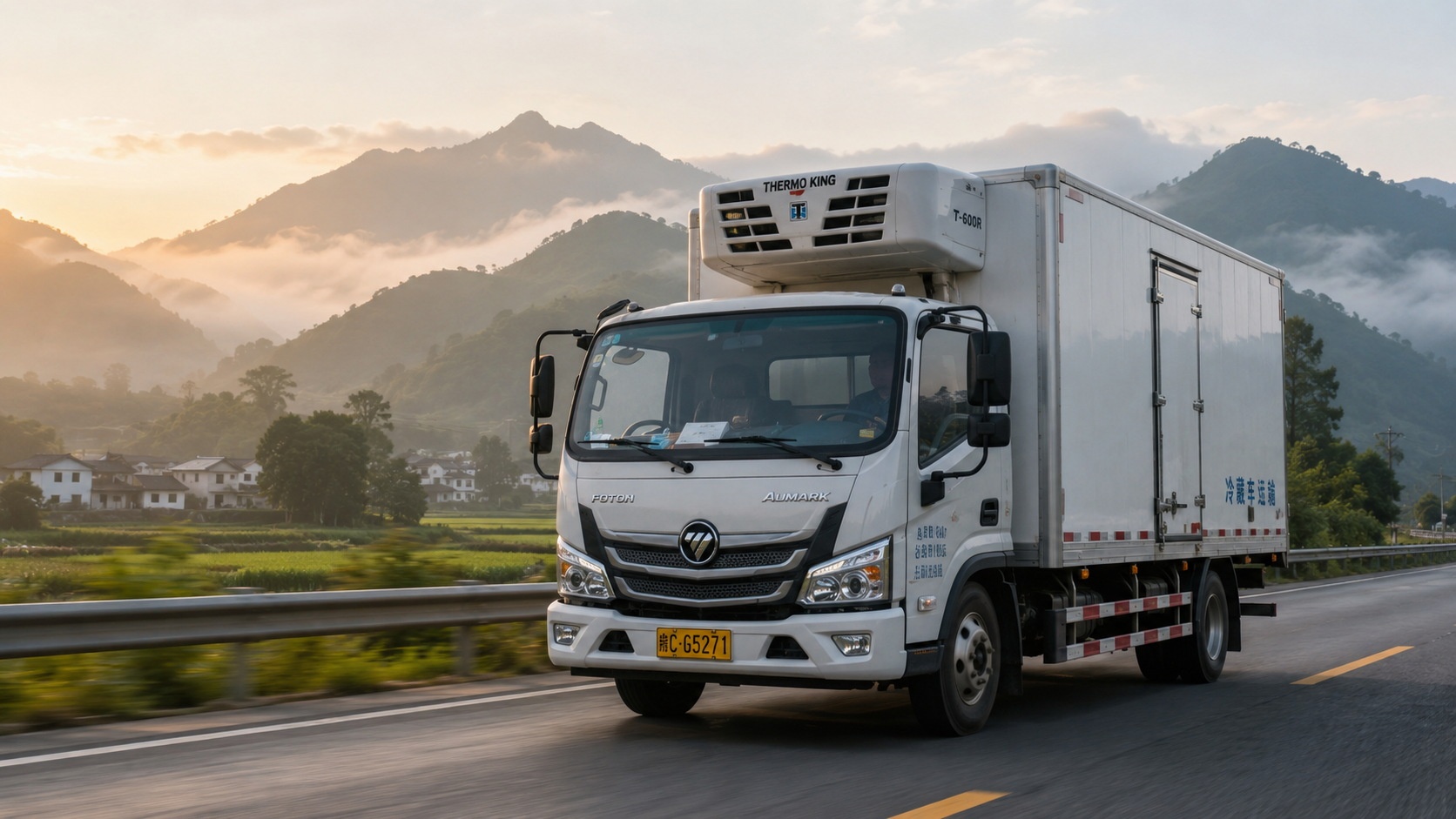 A cold chain logistics truck transporting fresh produce from rural farms to cities, illustrating the infrastructure behind year-round fruit availability.