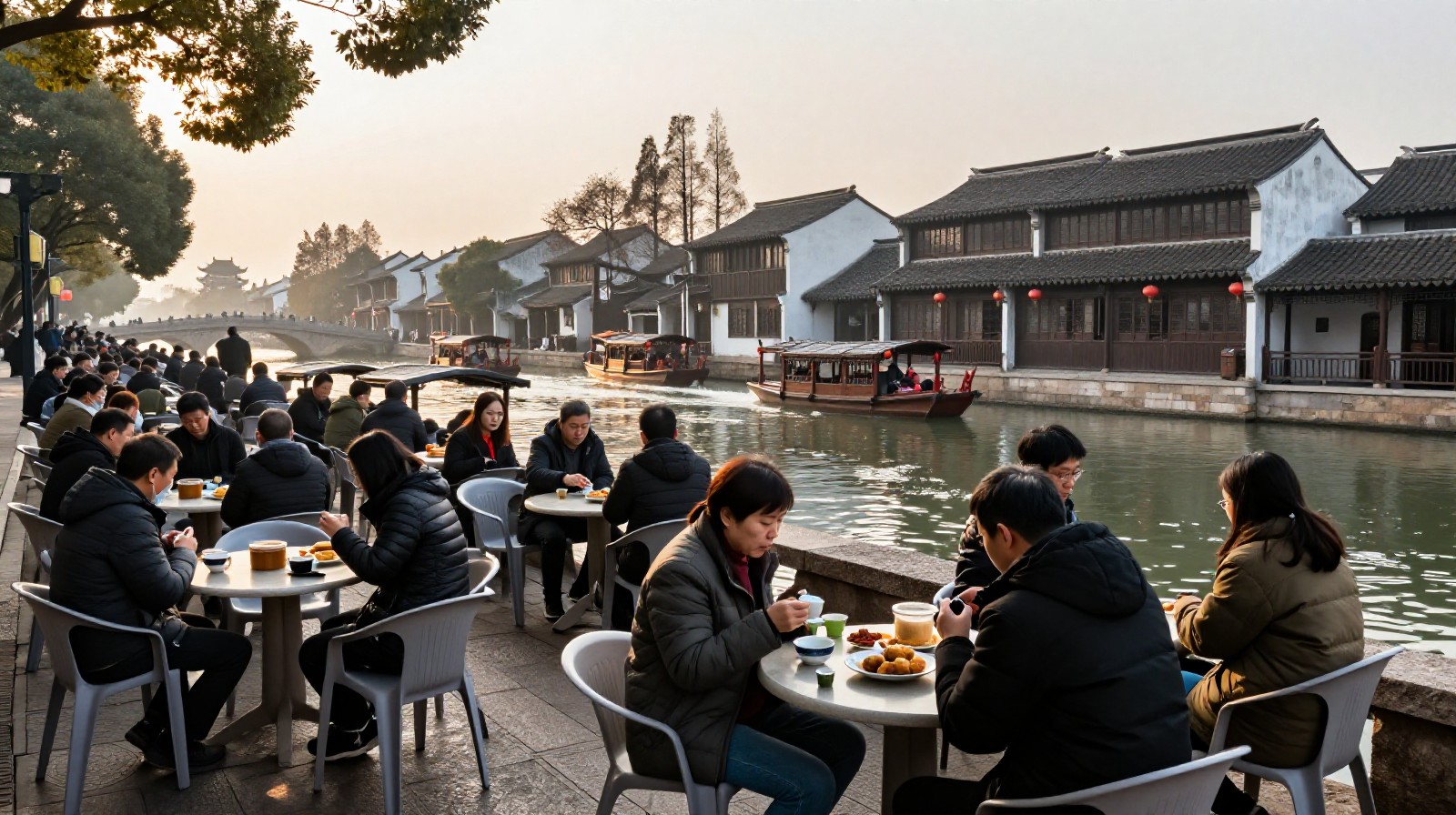 People enjoying morning tea outdoors by a canal in Yangzhou with traditional architecture