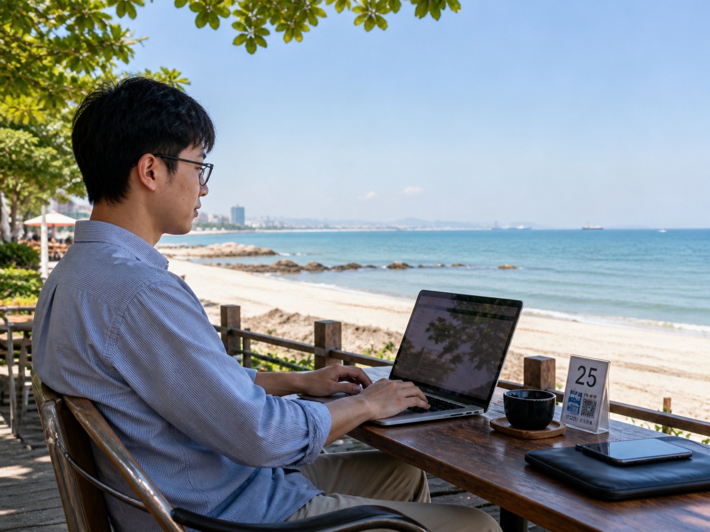 Young professional enjoying remote work with a sea view in Qinhuangdao