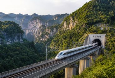 Why China’s High-Speed Rail Reaches Remote Mountains: The Logistics Power of a Unified Market