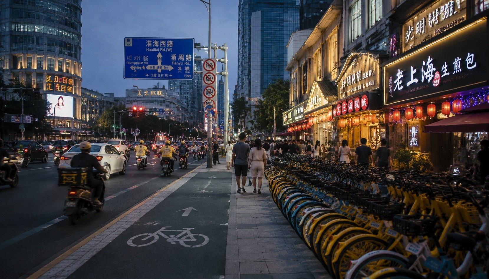 Busy Chinese intersection at dusk with marked bike lanes and neatly parked shared bikes near restaurants