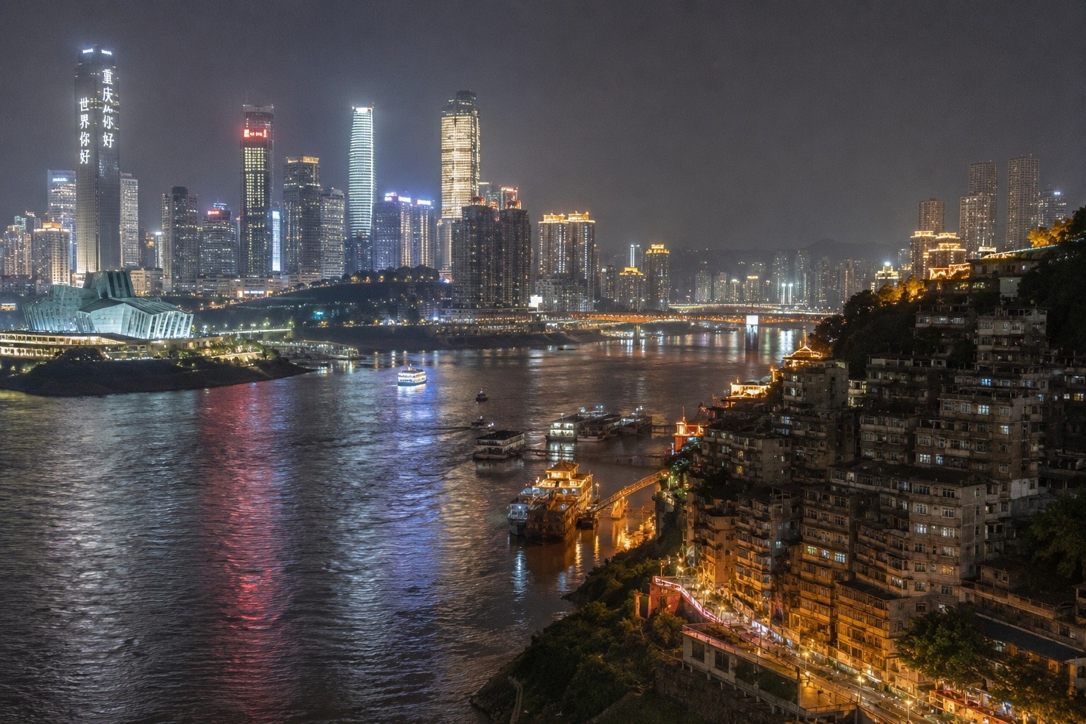 Panoramic view of Chongqing's two rivers meeting, showing the contrast between modern skyscrapers and traditional hillside neighborhoods.