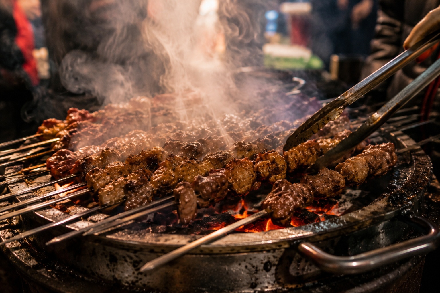 Beef skewers sizzling on a traditional charcoal grill in a Qiqihar street food stall.