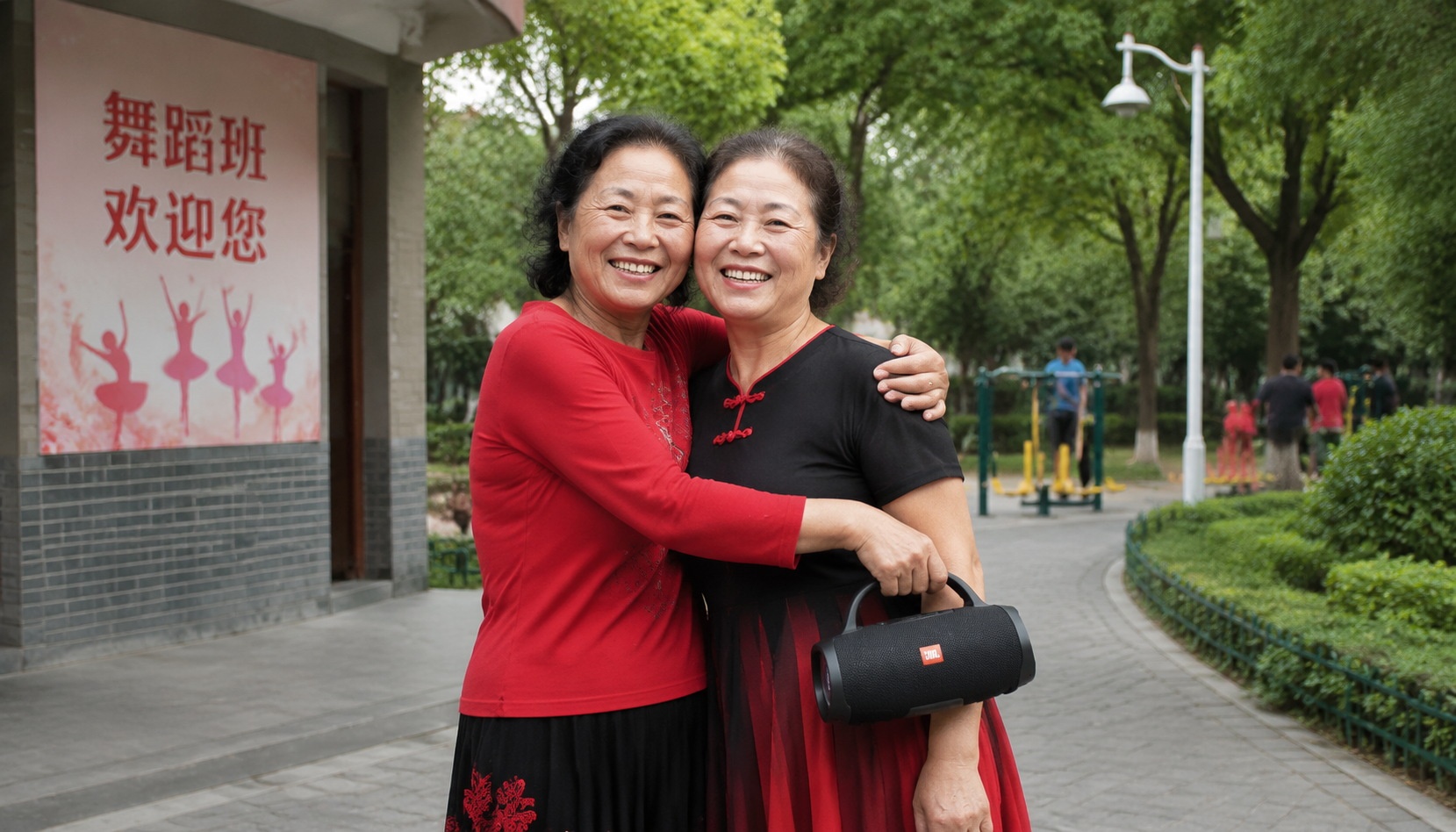 Two elderly Chinese friends embracing after square dancing in a park, one holding a portable speaker