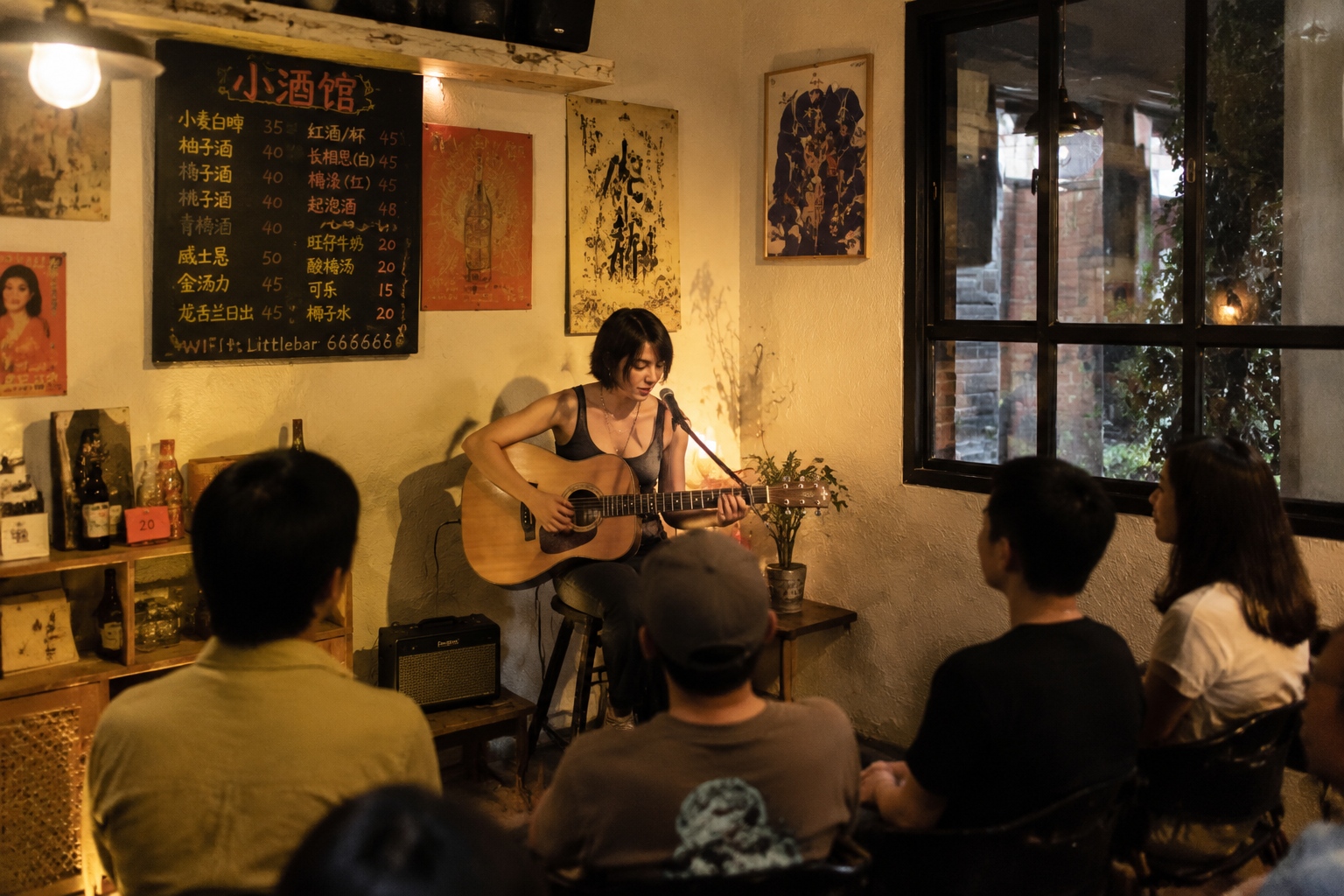 A small bar in Chengdu with live acoustic music and a small audience