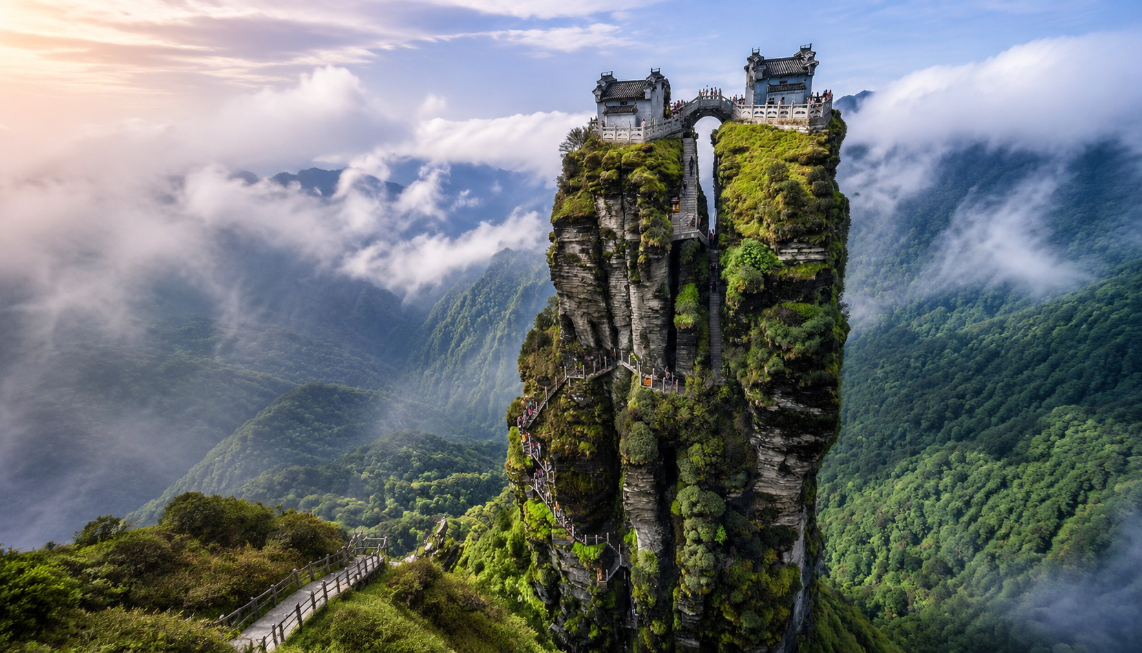 Panoramic view of Fanjingshan mountain with clouds and forest, a UNESCO World Heritage site in Guizhou, China