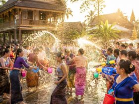 The Water Splashing Festival in Dehong: How Visitors and Villagers Create Shared Memories