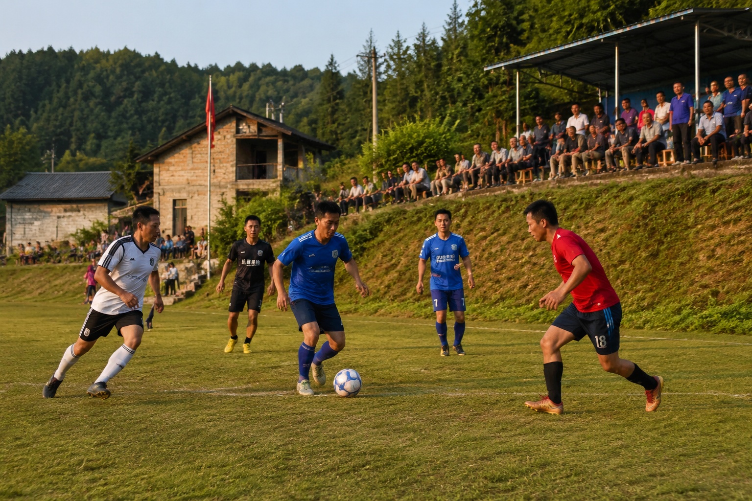 Villagers watching a Village Super League football match from a hillside in Guizhou, with players in colorful jerseys on the field below.