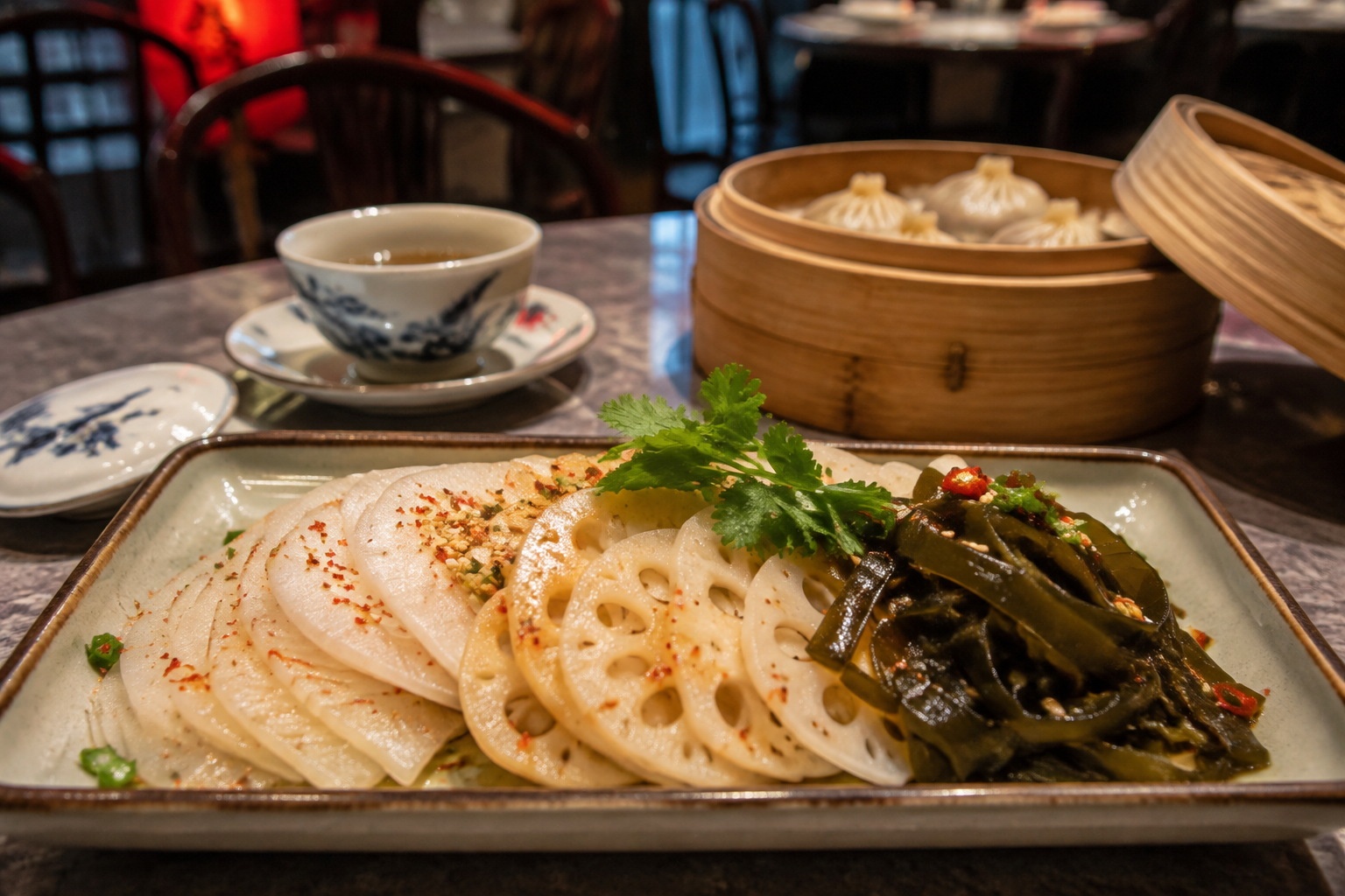 Sichuan pickle platter with radish, lotus root, and kelp in a restaurant