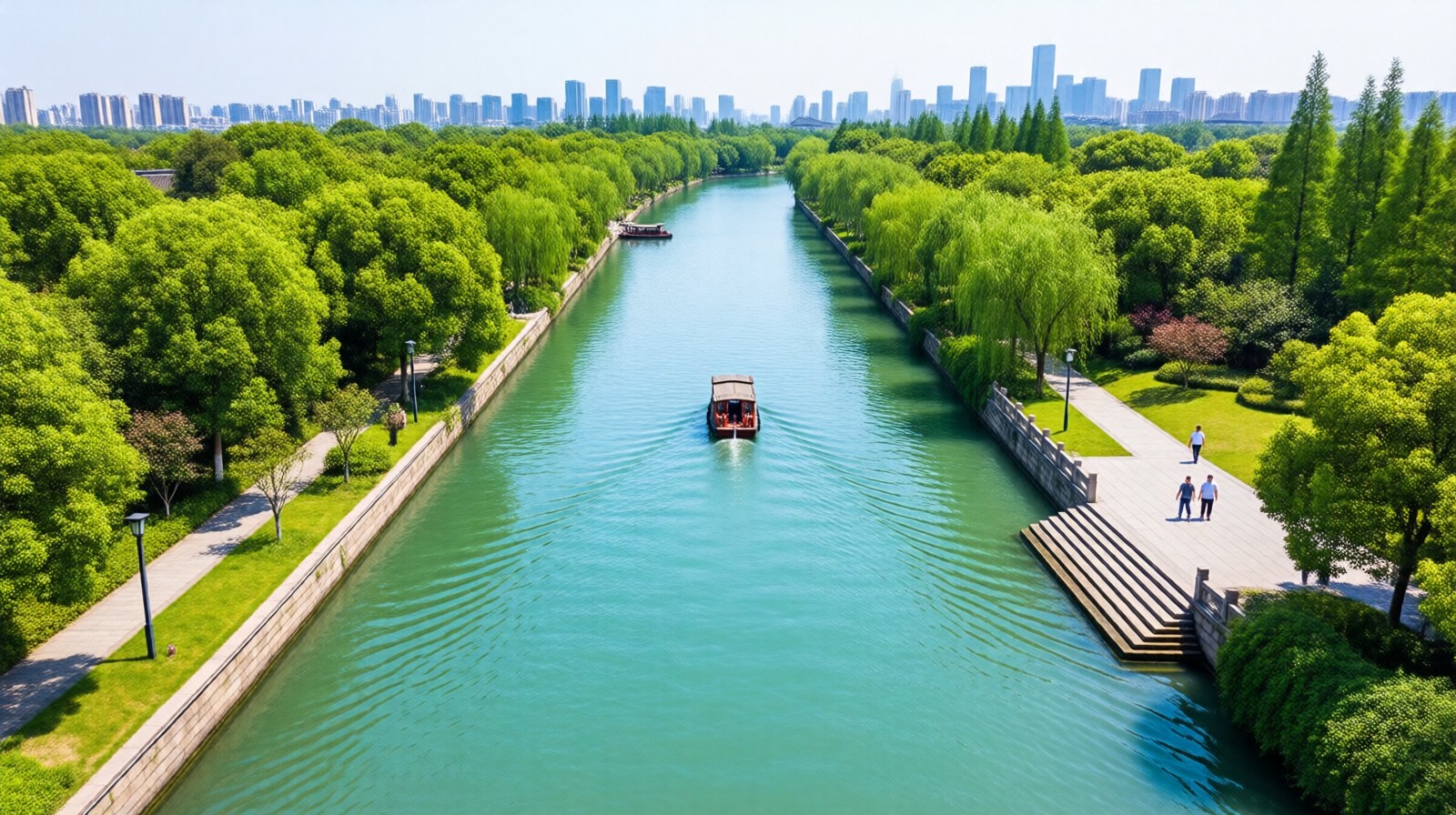 Restored Grand Canal section with park and city skyline in Hangzhou