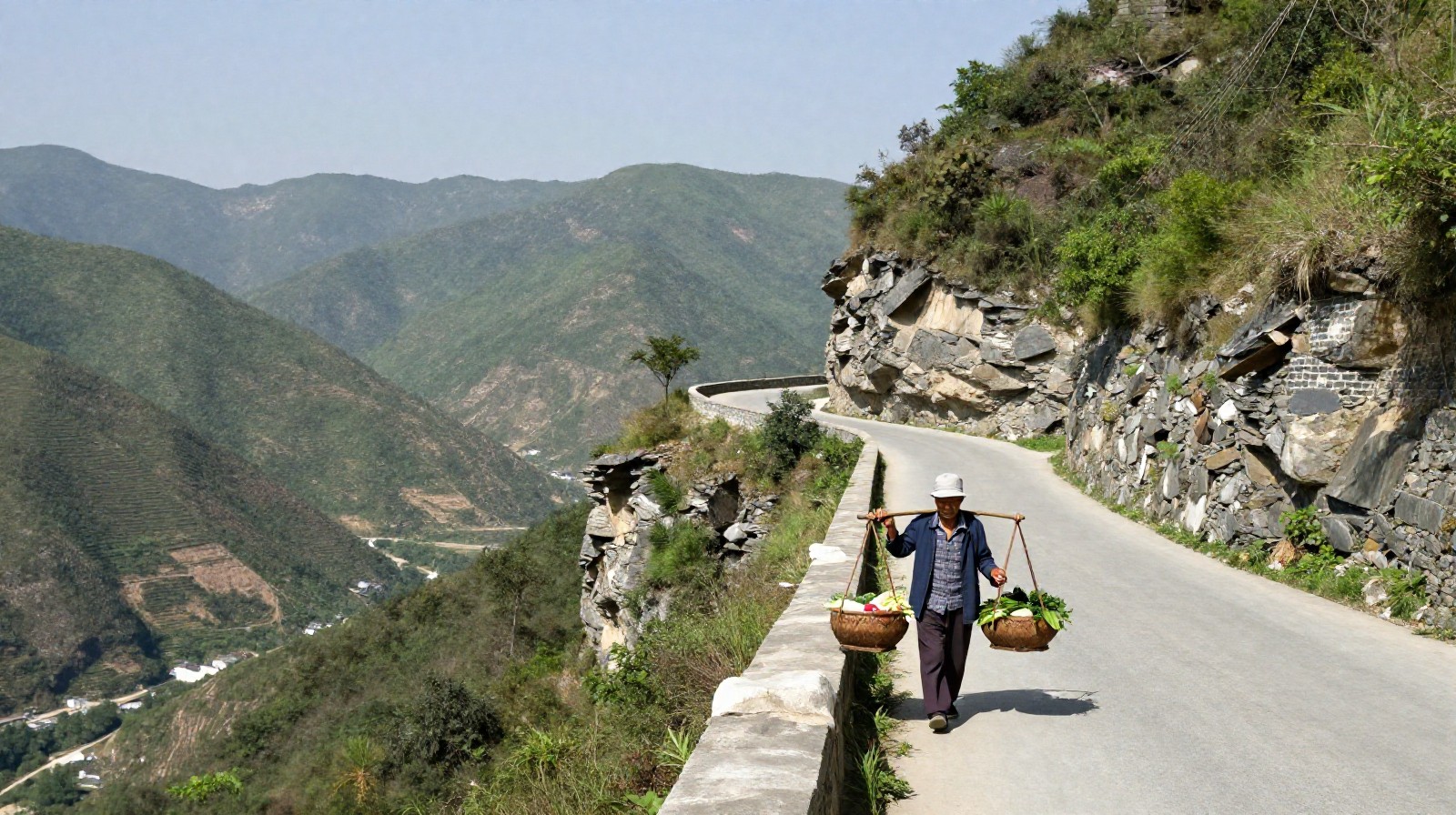 Elderly farmer walking on cliff road in Taihang Mountains with basket of vegetables, showing local livelihood