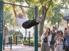 Chinese Grandpas Spinning on Bars, Leaving Foreign Tourists Stunned