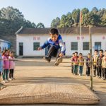 A Rural School Sports Day: High Jump on Straw Mats, Pure Childhood Joy