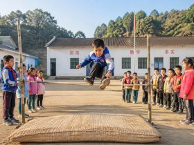 A Rural School Sports Day: High Jump on Straw Mats, Pure Childhood Joy