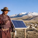 In Ali, Tibet, a Tibetan Man Uses Solar Panels to Charge His Phone and Also Keeps Fifty Sheep Thriving