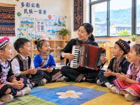 In Lvchun, Yunnan, Hani, Yi, and Dai Kids Share a Kindergarten, Singing Nursery Rhymes in Three Languages