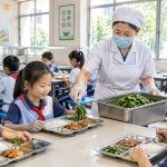 That Spoonful of Greens Traveled a Thousand Kilometers: The Invisible Supply Chain Behind China's School Lunches