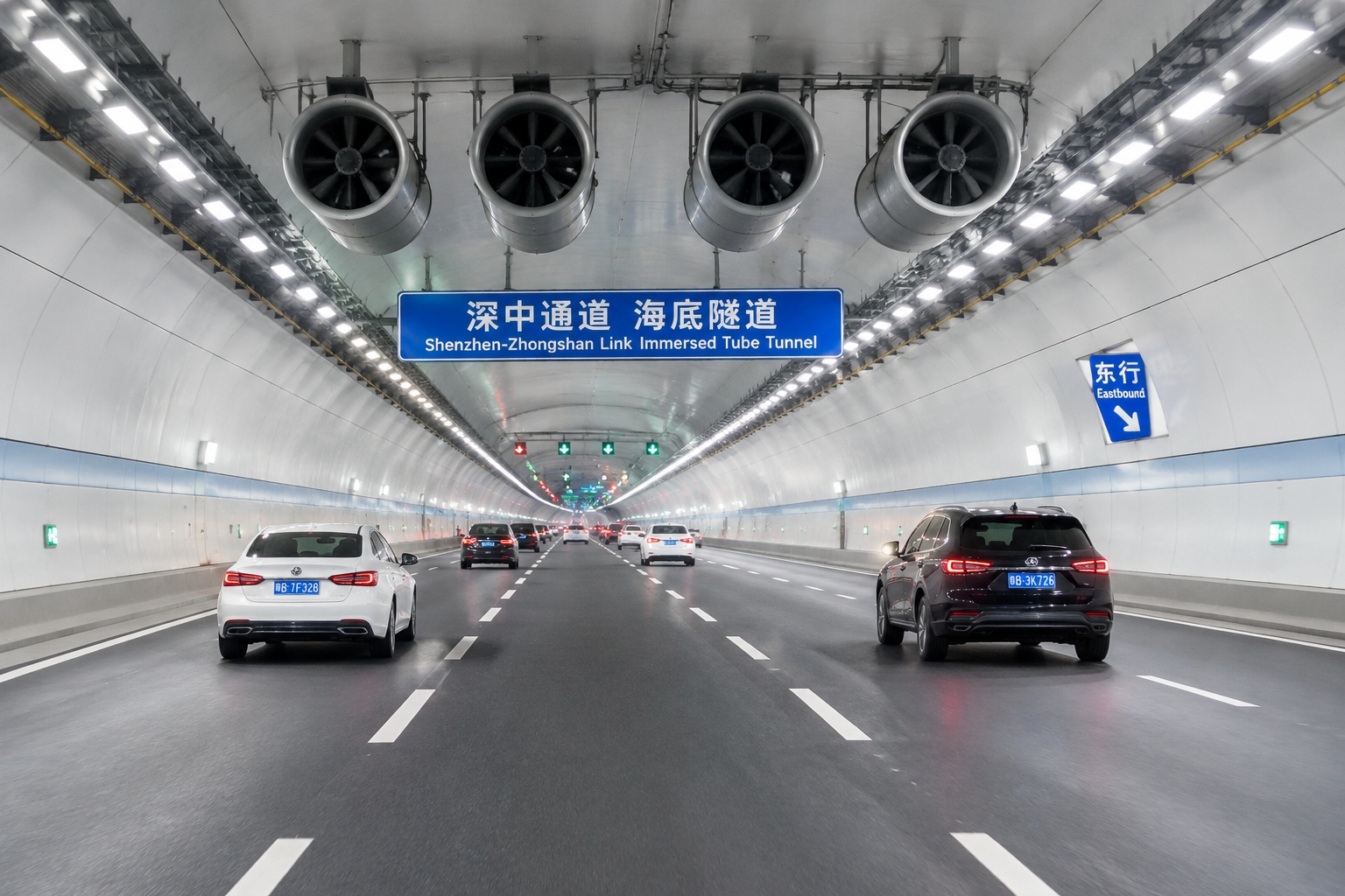 Shenzhen-Zhongshan Link: How a Bridge, Islands, and Tunnel Bring Two Cities Closer 23 Inside the immersed tube tunnel of the Shenzhen-Zhongshan Link, with cars and lane markings.