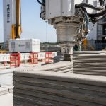 Robotic arm constructing 3D printed wall
