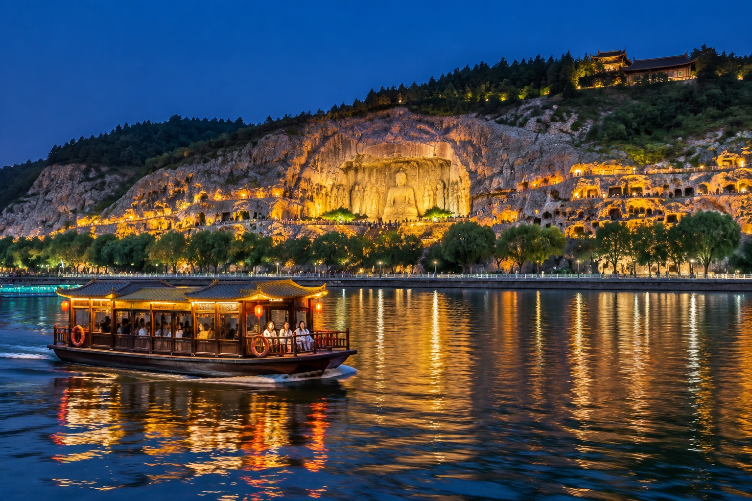 Longmen Grottoes: The Vairocana Buddha at Night Is More Stunning Than by Day 24 Illuminated cliffs of the Longmen Grottoes reflected in the Yi River at night, seen from the quieter east bank