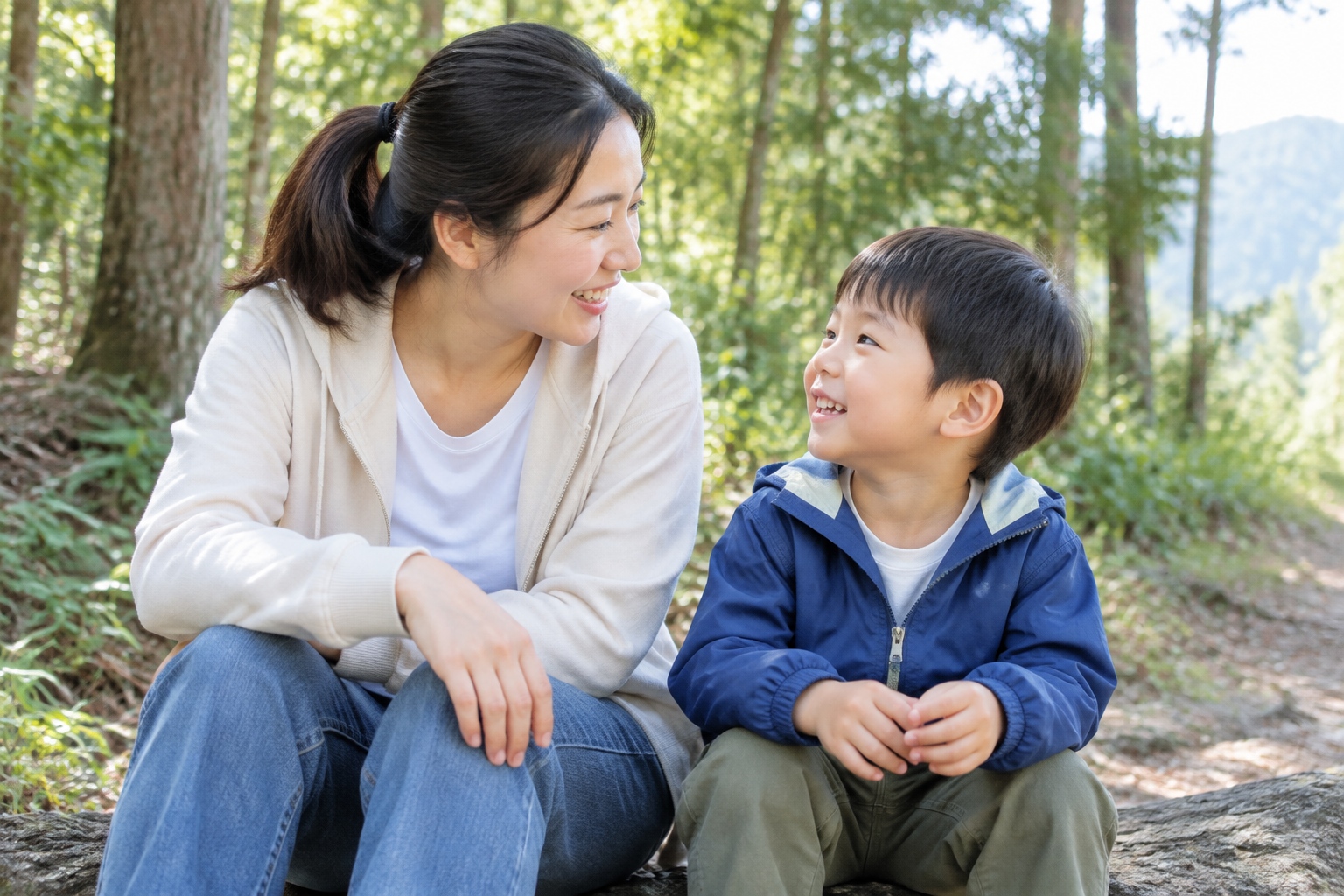 A Chinese mother talks with her young child at the edge of a forest, reflecting a parent's choice of alternative early education