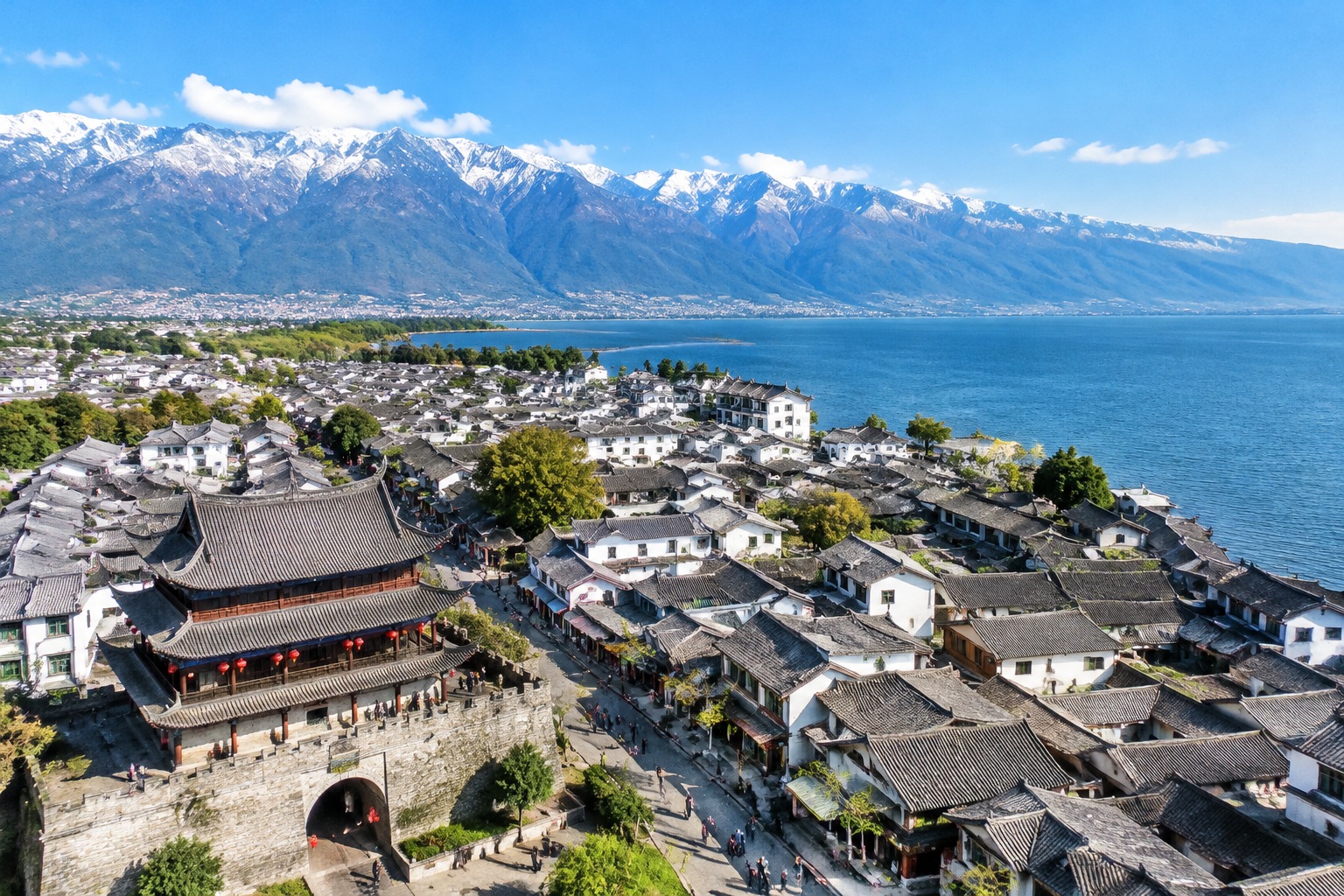 Aerial landscape of Dali old town and Cangshan mountains showcasing the natural beauty of Yunnan